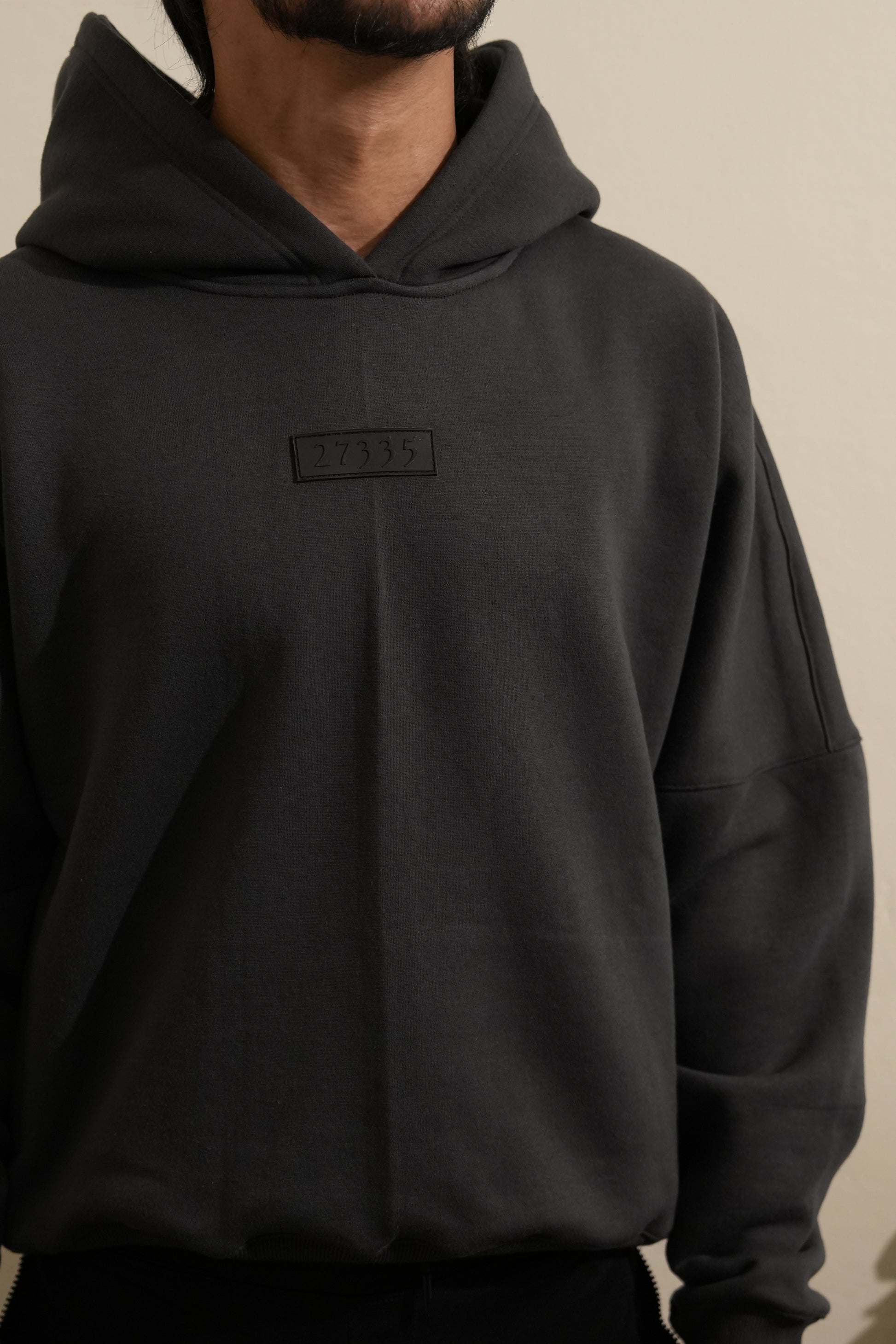 “The HOOD oversized unisex hoodie in Metal gray with 27335 designer label”