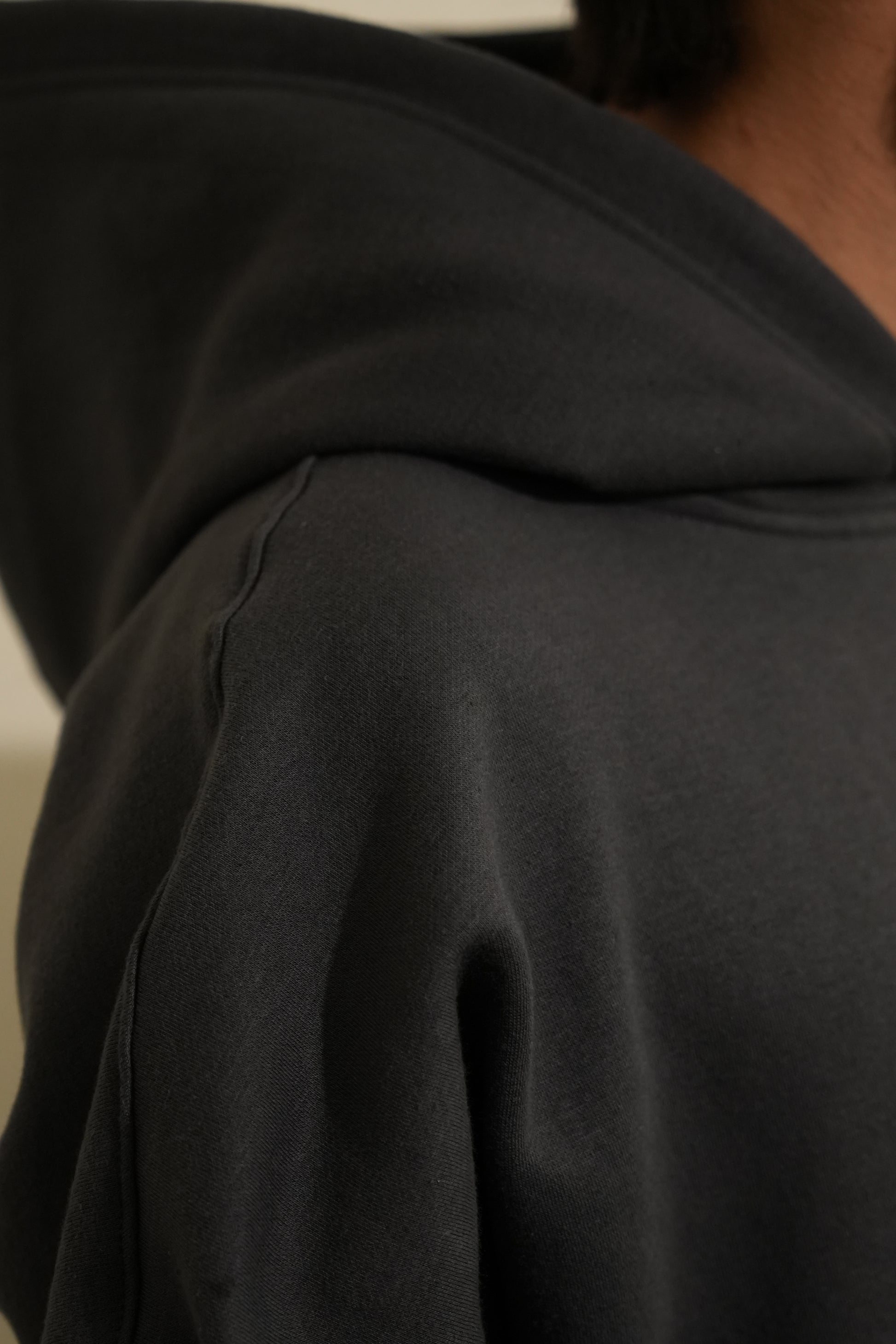 “The HOOD oversized unisex hoodie in Metal gray with 27335 designer label”